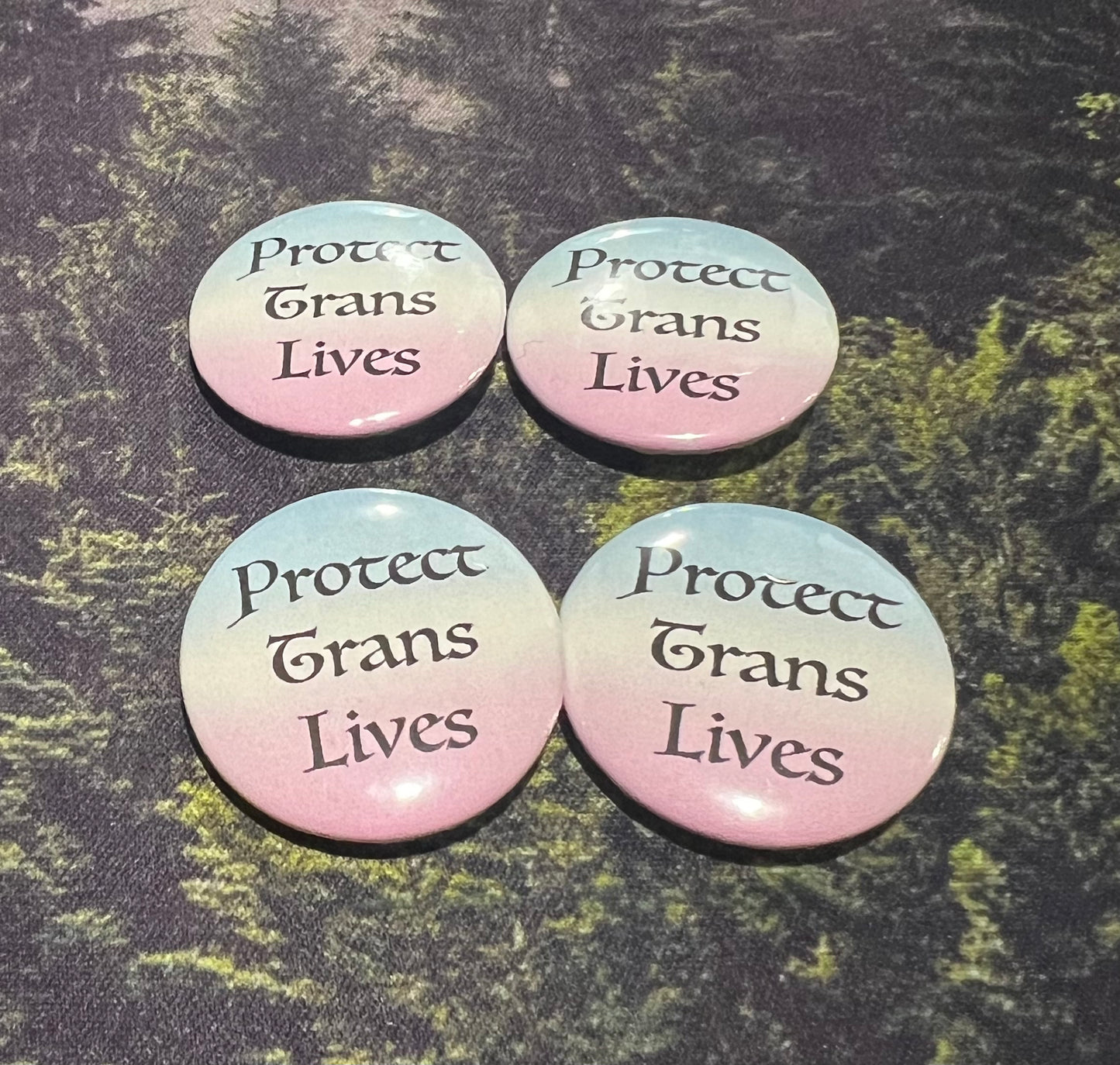 "Protect Trans Lives" button